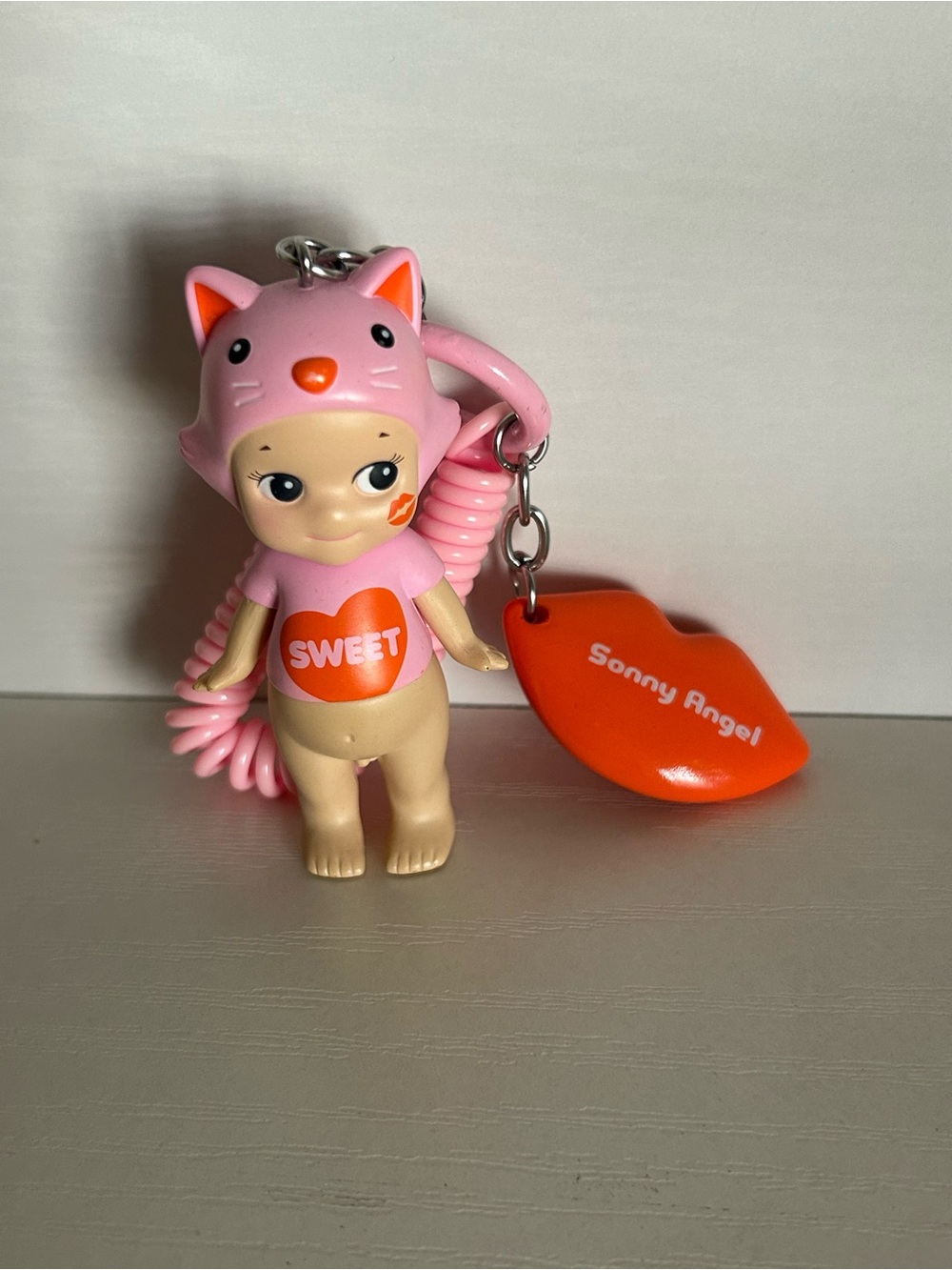 Sonny Angel Kiss Kiss Series bag charm.